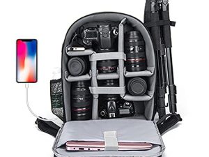 حقيبة ظهر للكاميرا من كادين لكاميرا DSLR / SLR عديمة المرآة مقاومة للماء مع حجرة كمبيوتر محمول مقاس 15.6 بوصة ومنفذ شحن USB وحامل ثلاثي القوائم وغطاء للمطر وحقيبة كاميرا متوافقة مع Sony Canon Nikon Black L